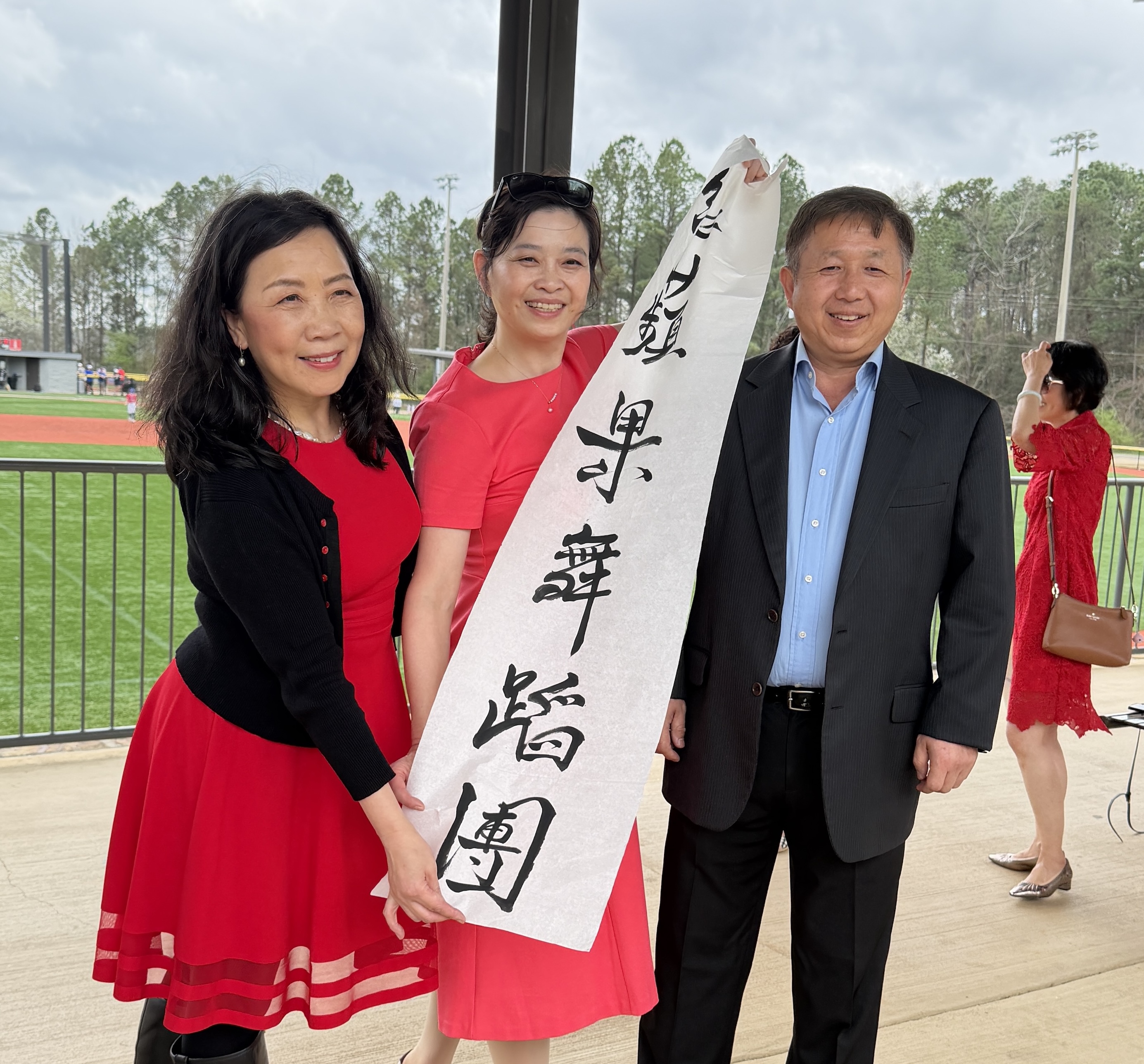 Red Apple Dance Group members smiling together